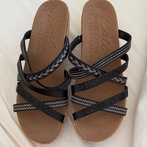Skechers Women's Black wedge slip on  Sandals size 9. Like new condition.